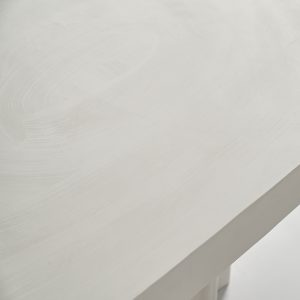 Biały stół do jadalni asymetryczny na falowanej nodze